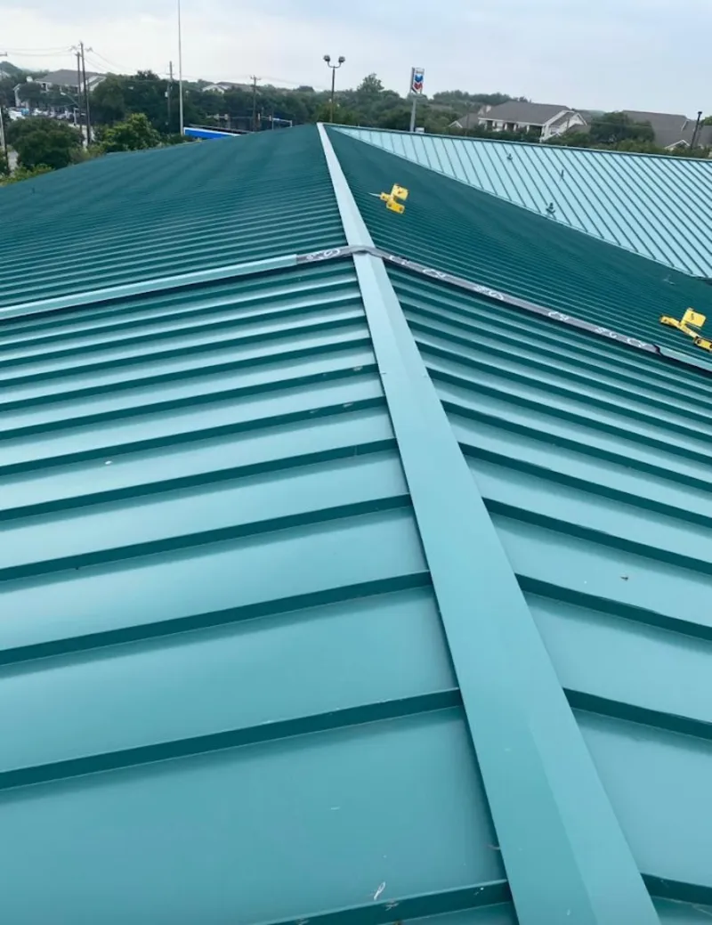 Green commercial metal roof ridge and valley for Metal Roof Repair in Scottsbluff